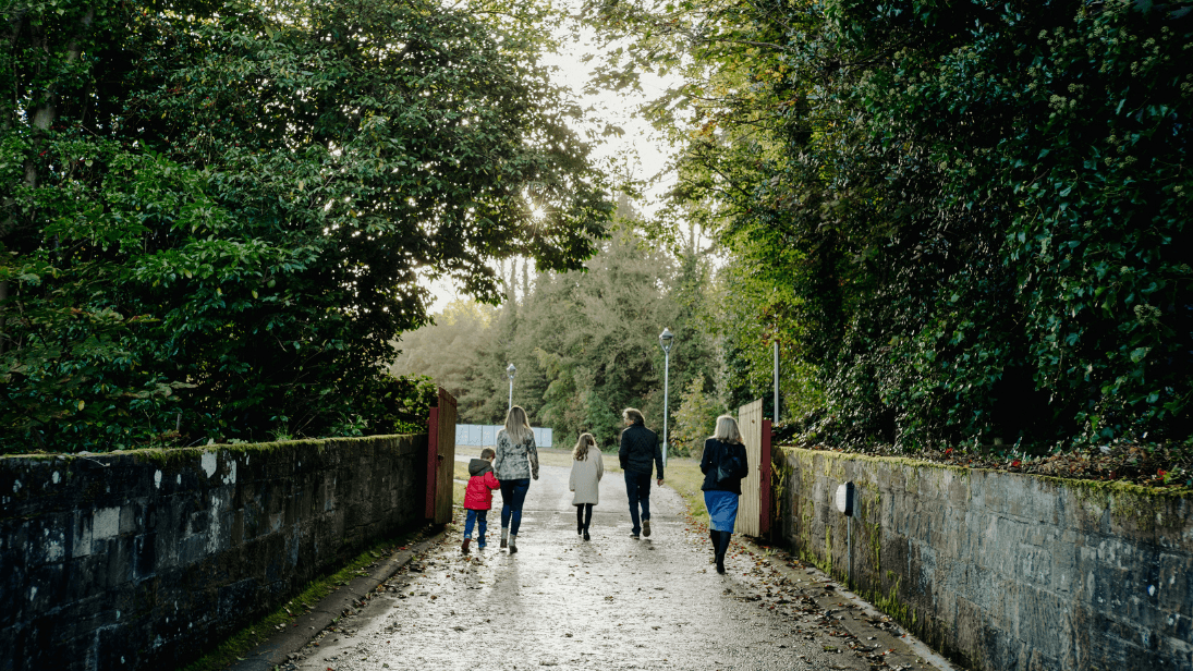 Family walking towards Ulster Transport Museum