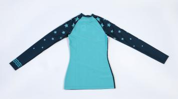 Turquoise long sleeved top with navy sleeves